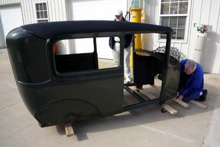 Terry Oberer ties down the 1930 Model A Tudor