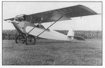 Pietenpol Air Camper N444MH in a cornfield by MacLaren